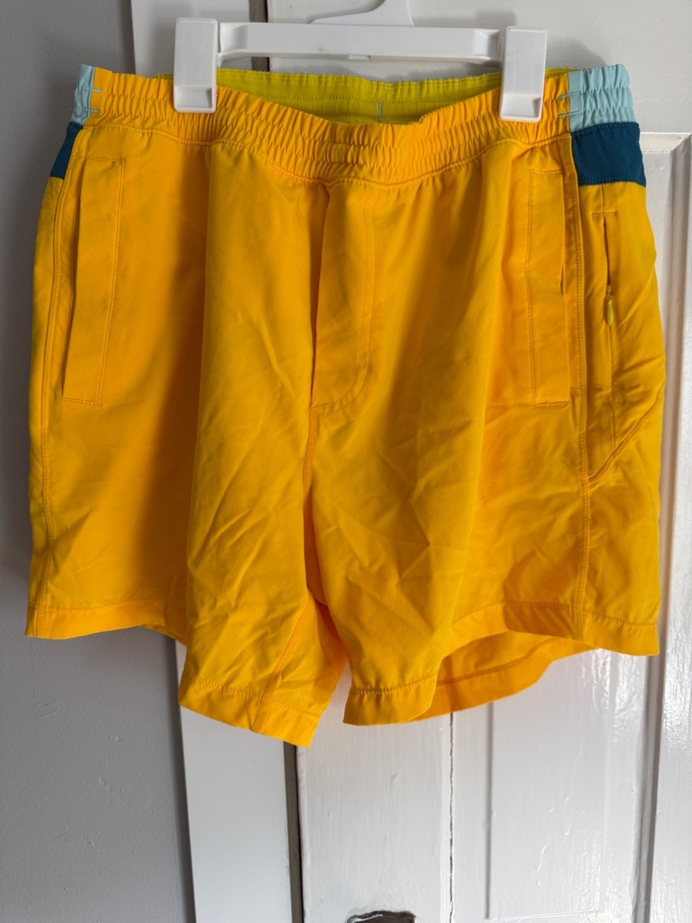 Birddogs Yellow Athletic Shorts with Teal Accent